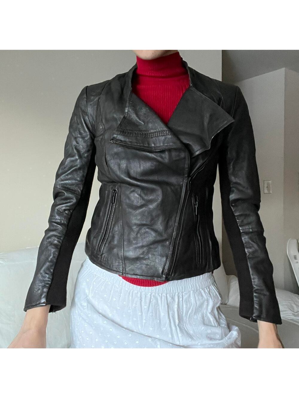 Dark brown leather jacket with  zipper on the side